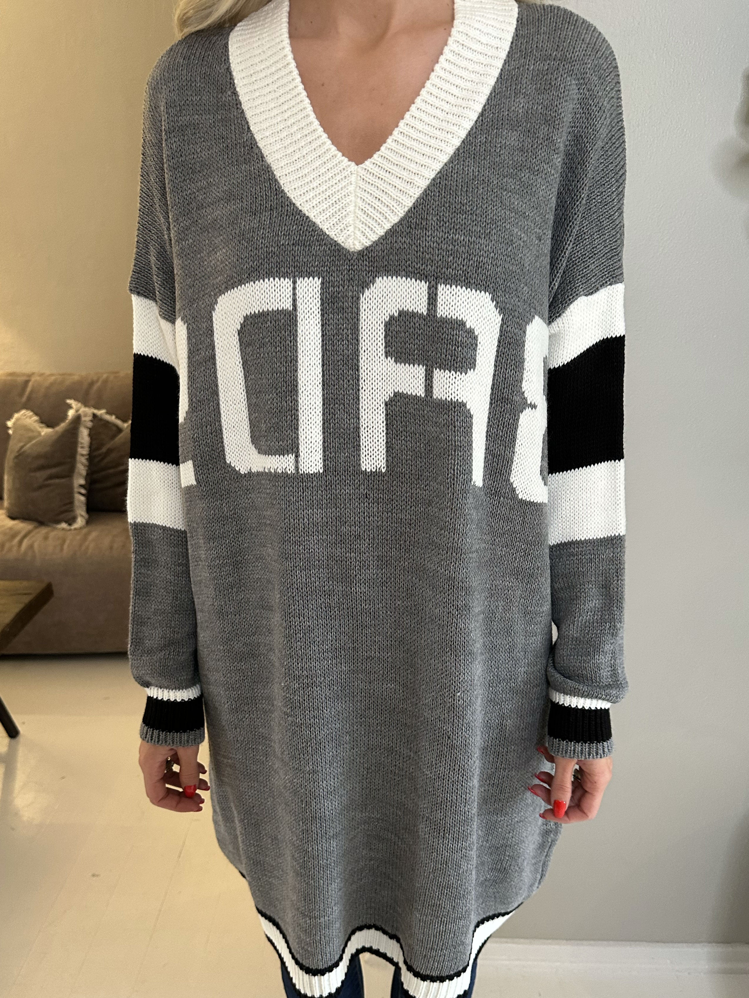 Elvira - Flerfärgad plus size stickad klänning med tryck